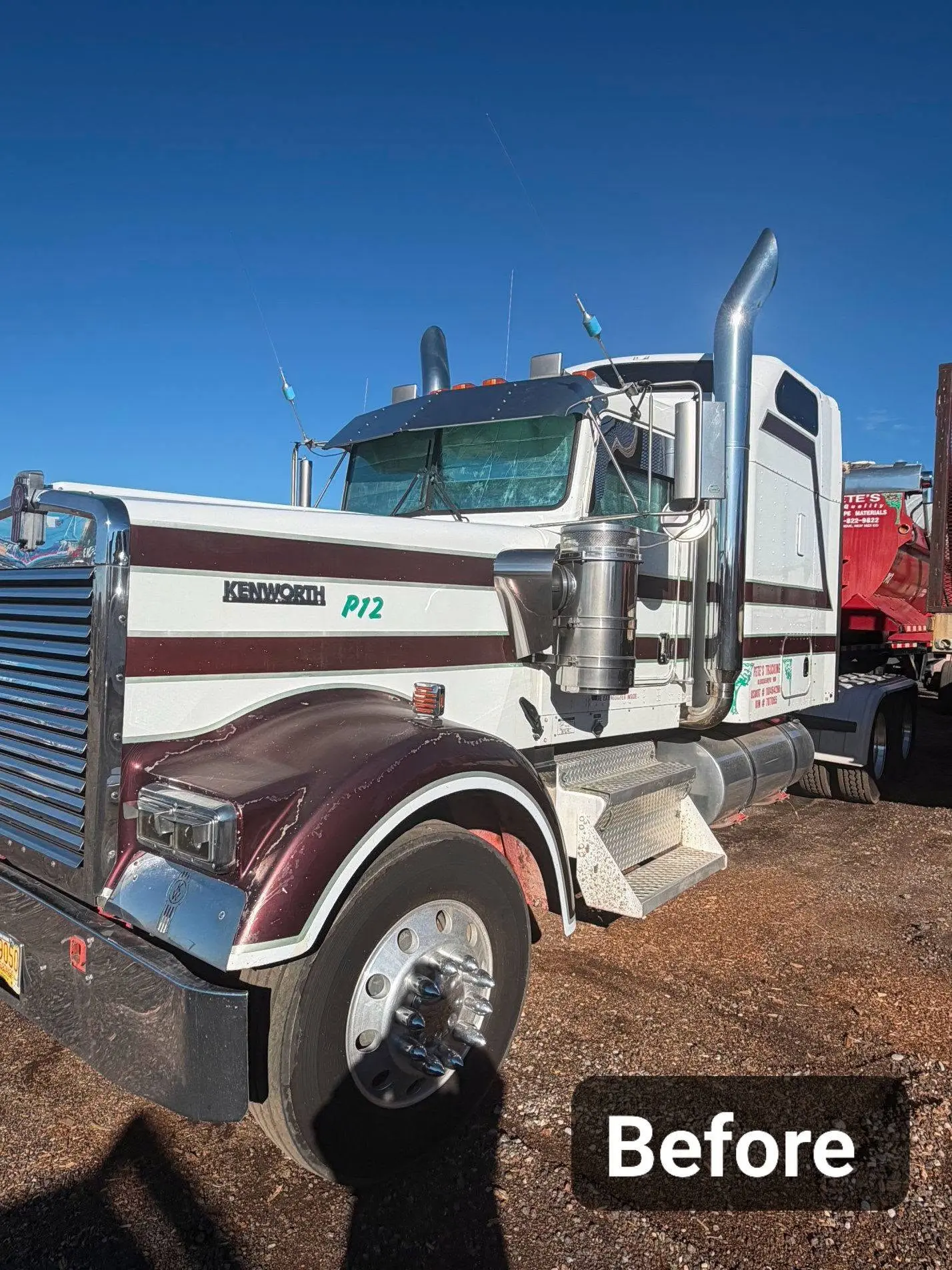 White and maroon Kenworth semi truck with faded, peeling paint before repaint