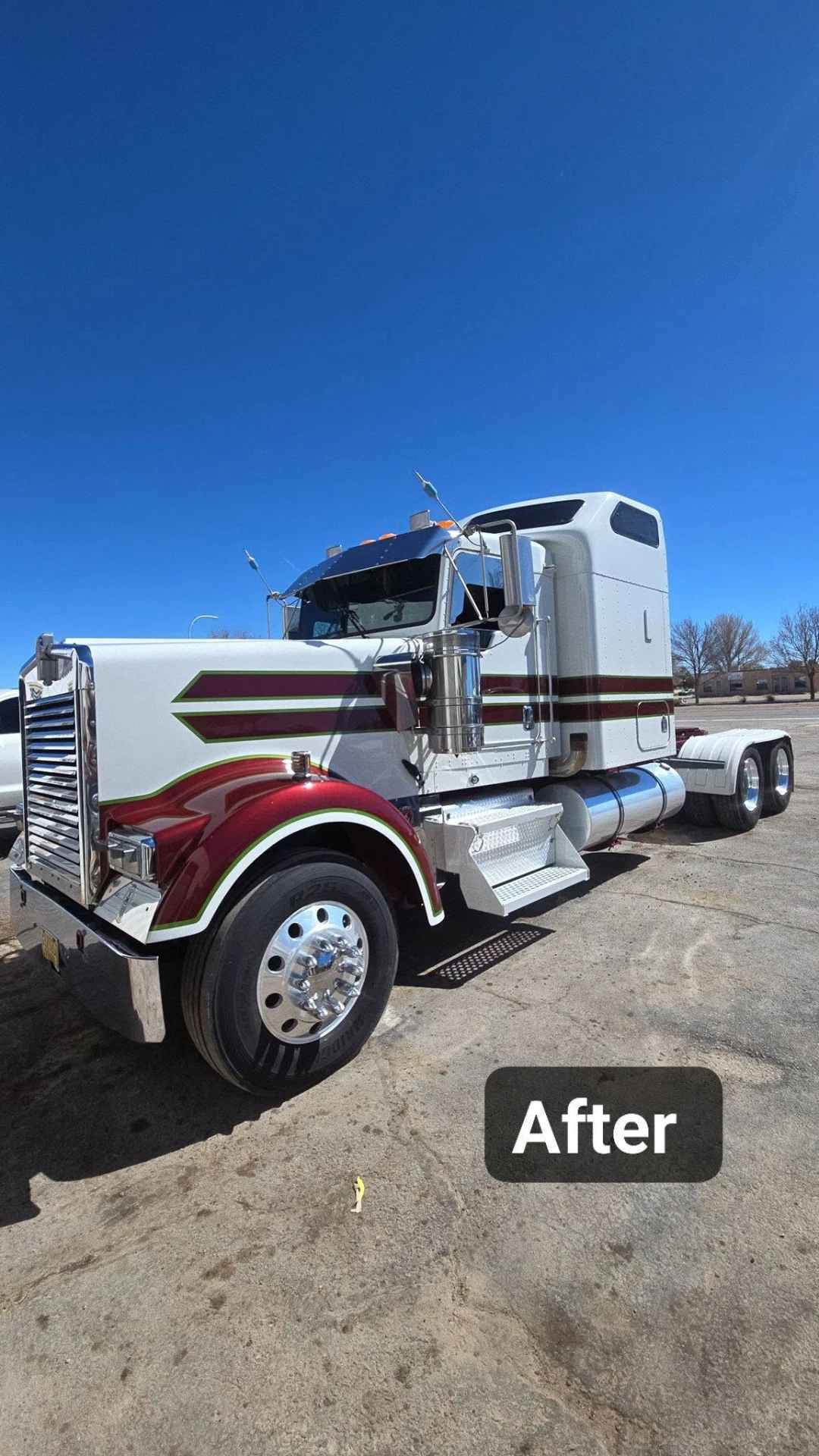 Same Kenworth semi truck after full repaint with glossy white finish and red and green custom stripes