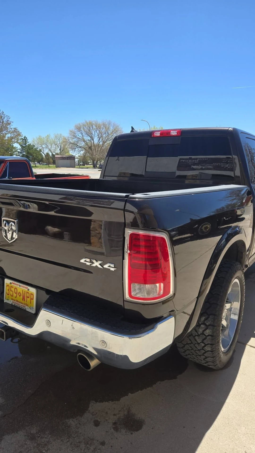 Same black Ram 1500 after collision repair with flawless paint and panel work